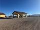 Covered carport with a terracotta tile roof at 3720 W Charleston Park Ave, Pahrump, NV 89048