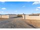 Gated entrance to a property with a long driveway leading to a large house at 3720 W Charleston Park Ave, Pahrump, NV 89048