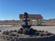 Ornate fountain with horse detail as a centerpiece in a landscaped area at 3720 W Charleston Park Ave, Pahrump, NV 89048