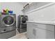 Convenient laundry room with front load washer and dryer at 3720 W Charleston Park Ave, Pahrump, NV 89048