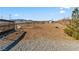 A spacious pasture area with metal fencing and a covered shelter at 3720 W Charleston Park Ave, Pahrump, NV 89048