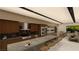 Modern kitchen with island and views to backyard at 4086 Heron Fairway Dr, Las Vegas, NV 89141