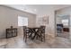 Small dining area with square table and four chairs at 4509 Glossier Ave, North Las Vegas, NV 89084