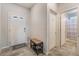 Bright entryway with tile flooring and access to bathroom at 4509 Glossier Ave, North Las Vegas, NV 89084