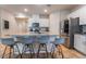 Modern kitchen with granite countertop island and stainless steel appliances at 4509 Glossier Ave, North Las Vegas, NV 89084