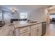 Kitchen island with granite countertop and stainless steel sink at 4509 Glossier Ave, North Las Vegas, NV 89084