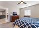 Main bedroom with dresser and view into living room at 4509 Glossier Ave, North Las Vegas, NV 89084