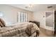 Bright bedroom featuring large window with coverings and a carpeted floor at 4650 Ranch House Rd # 42, North Las Vegas, NV 89031