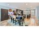 Dining area view with stylish decor, an elegant dining table, and a view of the kitchen at 4650 Ranch House Rd # 42, North Las Vegas, NV 89031