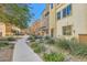 Landscaped pathway leading to townhome community at 4650 Ranch House Rd # 42, North Las Vegas, NV 89031