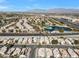 Aerial view of community near golf course with lake at 4921 Black Bear Rd # 104, Las Vegas, NV 89149