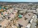 Aerial view of community featuring multiple buildings and a pool at 4921 Black Bear Rd # 104, Las Vegas, NV 89149