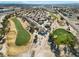 Aerial view of homes on a golf course at 4921 Black Bear Rd # 104, Las Vegas, NV 89149