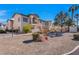 Two-story building with landscaping and walkway at 4921 Black Bear Rd # 104, Las Vegas, NV 89149