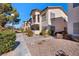 Two-story building with walkway and landscaping at 4921 Black Bear Rd # 104, Las Vegas, NV 89149