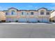 Attached garage with four units and parking at 4921 Black Bear Rd # 104, Las Vegas, NV 89149