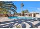 Community pool with a relaxing spa and shaded seating at 4921 Black Bear Rd # 104, Las Vegas, NV 89149