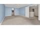 Spacious bedroom with carpet and access to bathroom at 503 Fragrant Orchard St, Henderson, NV 89015