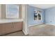 Bedroom with built-in cabinets and window with blinds at 503 Fragrant Orchard St, Henderson, NV 89015