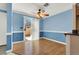 Light and bright dining area with hardwood floors and sliding door to patio at 503 Fragrant Orchard St, Henderson, NV 89015