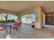 Covered patio area with table and chairs at 503 Fragrant Orchard St, Henderson, NV 89015