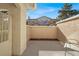 Small private patio with seating area, ideal for relaxing at 503 Fragrant Orchard St, Henderson, NV 89015