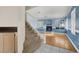 View of staircase leading to living area with fireplace at 503 Fragrant Orchard St, Henderson, NV 89015