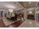 Open concept dining area with hardwood floors and chandelier at 52 Innisbrook Ave, Las Vegas, NV 89113