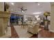 Bright living room with hardwood floors and large windows at 52 Innisbrook Ave, Las Vegas, NV 89113