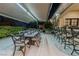 Outdoor dining area with retractable awning at 52 Innisbrook Ave, Las Vegas, NV 89113