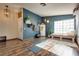 Home exercise room with hardwood floors and natural light at 5242 Dickens Dr, Las Vegas, NV 89119