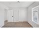 Bedroom with carpet, door and window at 5264 Lookout St, Las Vegas, NV 89120