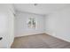 Well-lit bedroom with carpet and sliding door at 5264 Lookout St, Las Vegas, NV 89120