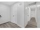 Bright entryway with white doors and grey vinyl flooring at 5264 Lookout St, Las Vegas, NV 89120