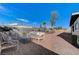 Landscaped backyard with gravel, patio furniture, and seating area at 6252 Fairwood Ave, Las Vegas, NV 89107