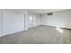 Bright bedroom with plush carpet and double door closet at 6252 Fairwood Ave, Las Vegas, NV 89107