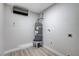 Laundry room with vinyl flooring and stacked washer/dryer hookups at 6252 Fairwood Ave, Las Vegas, NV 89107