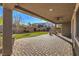 Covered patio with pavers and artificial turf at 6288 Starflare St, Las Vegas, NV 89148