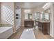 Spa-like bathroom with granite counters and walk in shower at 6288 Starflare St, Las Vegas, NV 89148