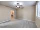 Well-lit bedroom with a large closet and ceiling fan at 6288 Starflare St, Las Vegas, NV 89148