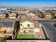 Aerial view of house, backyard, and neighborhood at 633 Finch Island Ave, Henderson, NV 89015