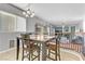 Breakfast nook with a table and chairs, overlooking the Gathering room at 633 Finch Island Ave, Henderson, NV 89015