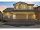 Two-story house with a landscaped yard and two-car garage at 633 Finch Island Ave, Henderson, NV 89015