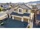 Two-story house with a two-car garage at 633 Finch Island Ave, Henderson, NV 89015