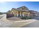 Two-story house with a landscaped yard and two-car garage at 633 Finch Island Ave, Henderson, NV 89015