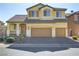 Two-story house with a landscaped yard and two-car garage at 633 Finch Island Ave, Henderson, NV 89015