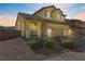 Two-story house with a landscaped yard and two-car garage at 633 Finch Island Ave, Henderson, NV 89015