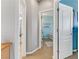 Bright hallway with doors to bedrooms and bath at 633 Finch Island Ave, Henderson, NV 89015