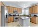 Modern kitchen with stainless steel appliances and granite countertops at 633 Finch Island Ave, Henderson, NV 89015