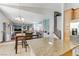 Kitchen with granite island and view of the Gathering room at 633 Finch Island Ave, Henderson, NV 89015